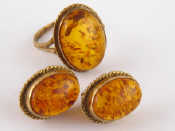 Appraisal: A carat gold amber ring with matching earrings ring size