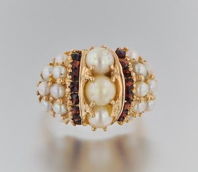 Appraisal: A Ladies' Pearl and Garnet Ring k yellow gold ring