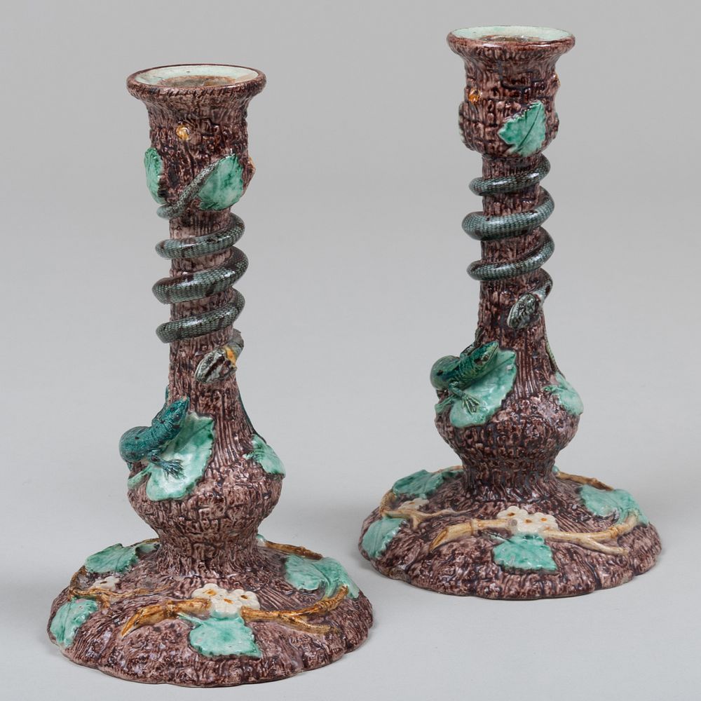 Appraisal: Pair of Continental Palissy Style Majolica Candlesticks Black painted 'T