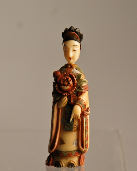 Appraisal: A Carved Polychromed Figural Ivory Snuff Bottle in the form