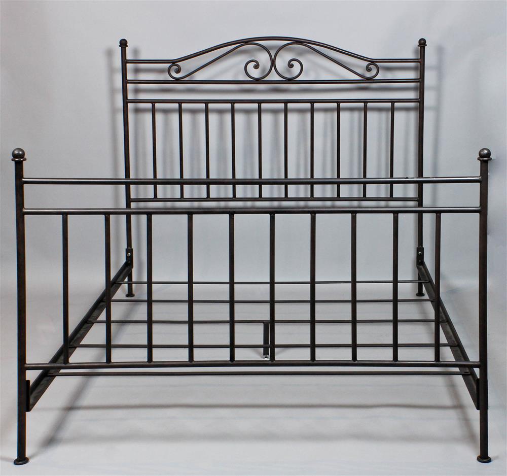 Appraisal: IRON QUEEN SIZE BED FRAME the headboard having a arched