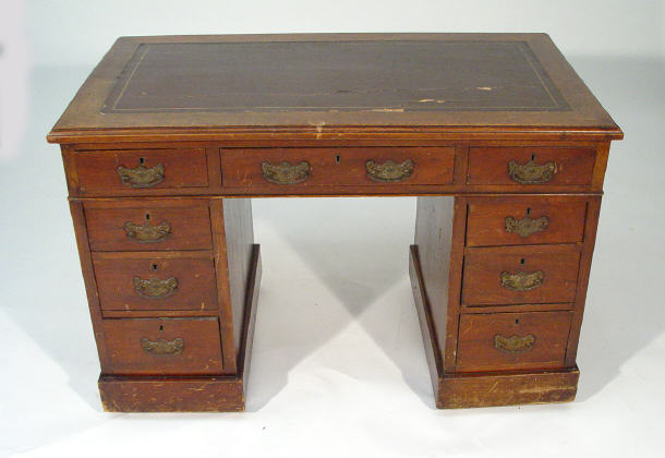 Appraisal: Victorian mahogany desk fitted a tooled leather top above an