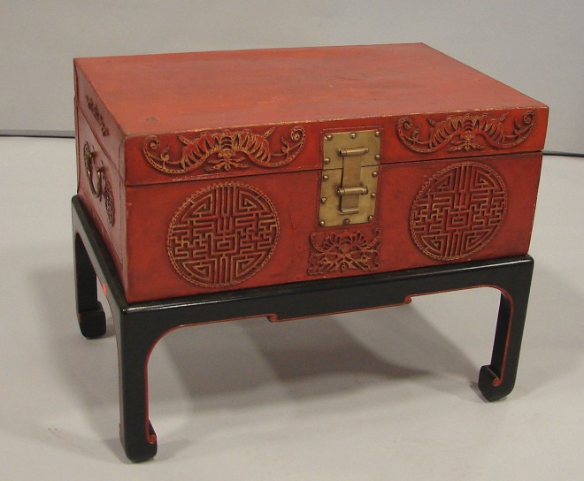 Appraisal: Decorated with red paint and Chinese motif over animal hide