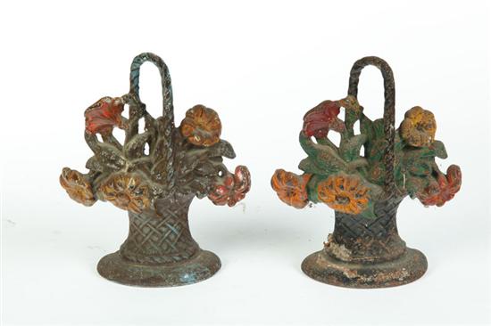 Appraisal: PAIR OF FLORAL BASKET DOOR STOPS American st half- th