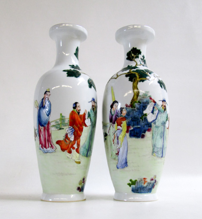 Appraisal: A PAIR OF CHINESE PORCELAIN VASES each decorated with enameled