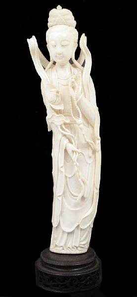 Appraisal: A Chinese carved ivory figure of a beauty th century