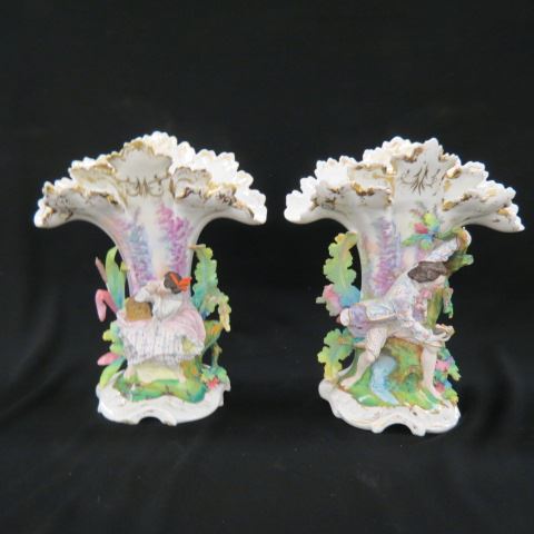 Appraisal: Pair of Old Paris Porcelain Vases figural seated man woman