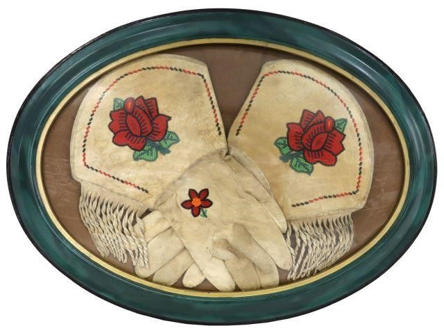 Appraisal: Framed pair of leather gauntlets decorated with floral form beads