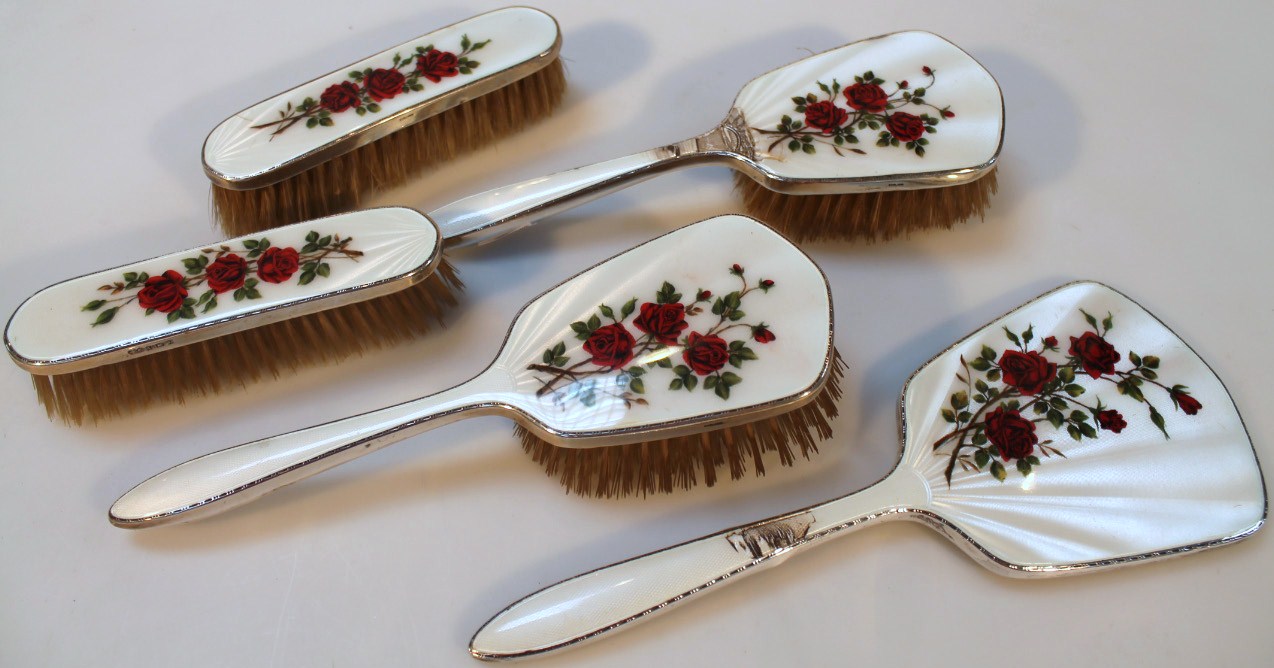 Appraisal: A Queen Elizabeth II silver and enamel finish dressing table