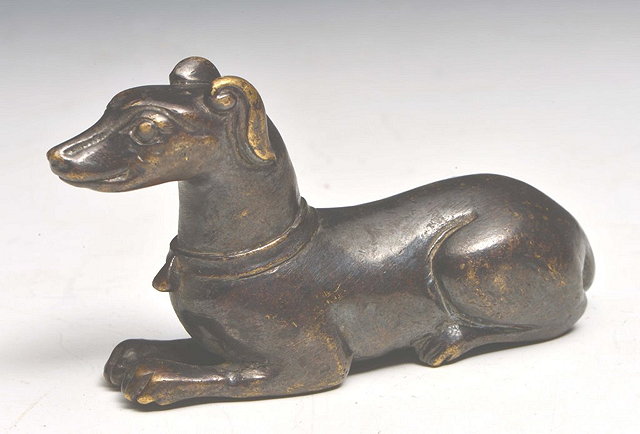 Appraisal: A CHINESE BRONZE SCROLL WEIGHT in the form of a