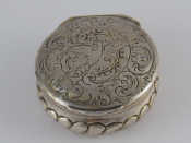 Appraisal: An th century silver box with heavy gadrooning offset hinge