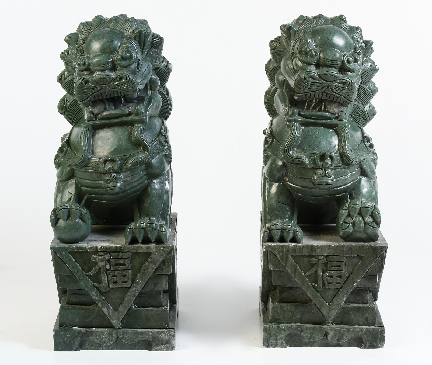 Appraisal: PAIR OF LARGE CHINESE SOAPSTONE FOO DOGS A set of