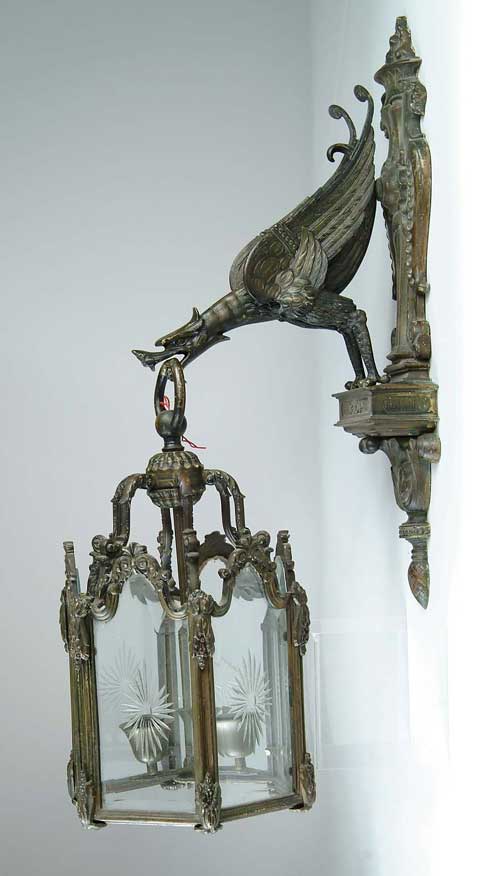 Appraisal: OUTSTANDING BRONZE TWO-PIECE FIGURAL WALL HANGING HALL FIXTURE The fixture