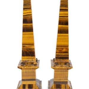 Appraisal: A Pair of Tiger's Eye Agate Veneer Obelisks by Raffaello