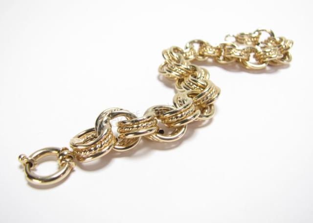 Appraisal: K Yellow Gold Italian spiral triple link fashion bracelet by