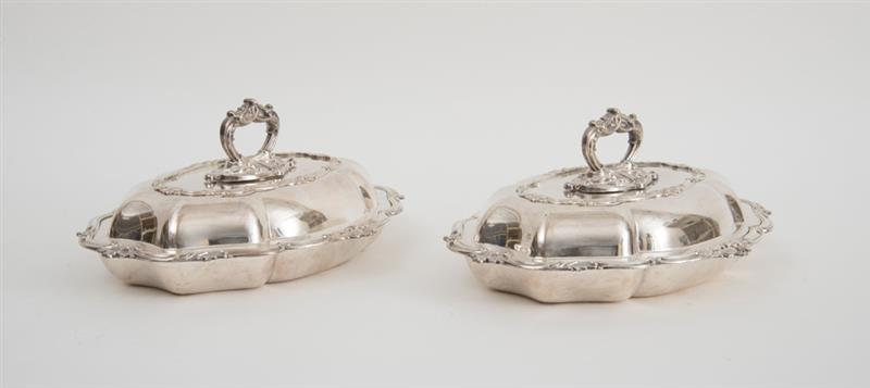 Appraisal: PAIR OF ENGLISH SILVER-PLATED ENTREE DISHES AND COVERS Impressed hand