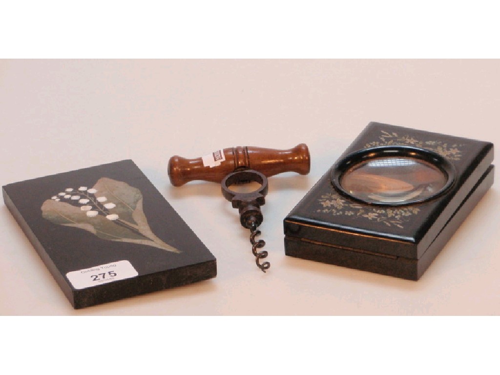 Appraisal: A painted ebonised view card enlarger corkscrew and pietra-dura panel