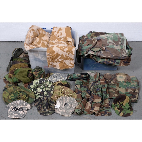 Appraisal: Miscellaneous Camouflage uniforms hats and belts used by the later