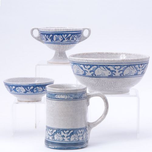 Appraisal: DEDHAM Four Crackleware pieces in the Clockwise Rabbit pattern a