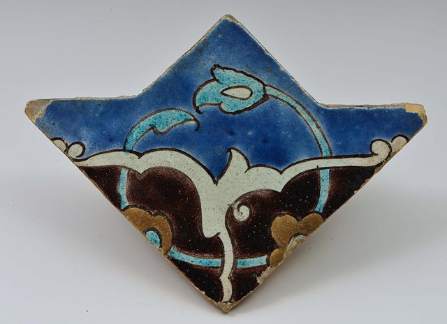 Appraisal: A SAFAVID CUERDA SECA TILE FRAGMENT Persia th Century cm