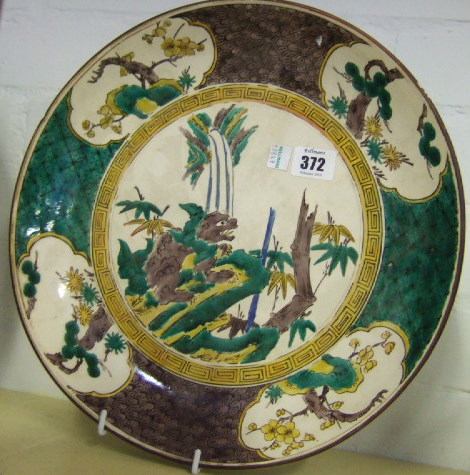 Appraisal: An Ao Kutani saucer dish th century painted with a