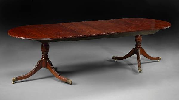 Appraisal: A Regency style mahogany twin pedestal dining table The oval