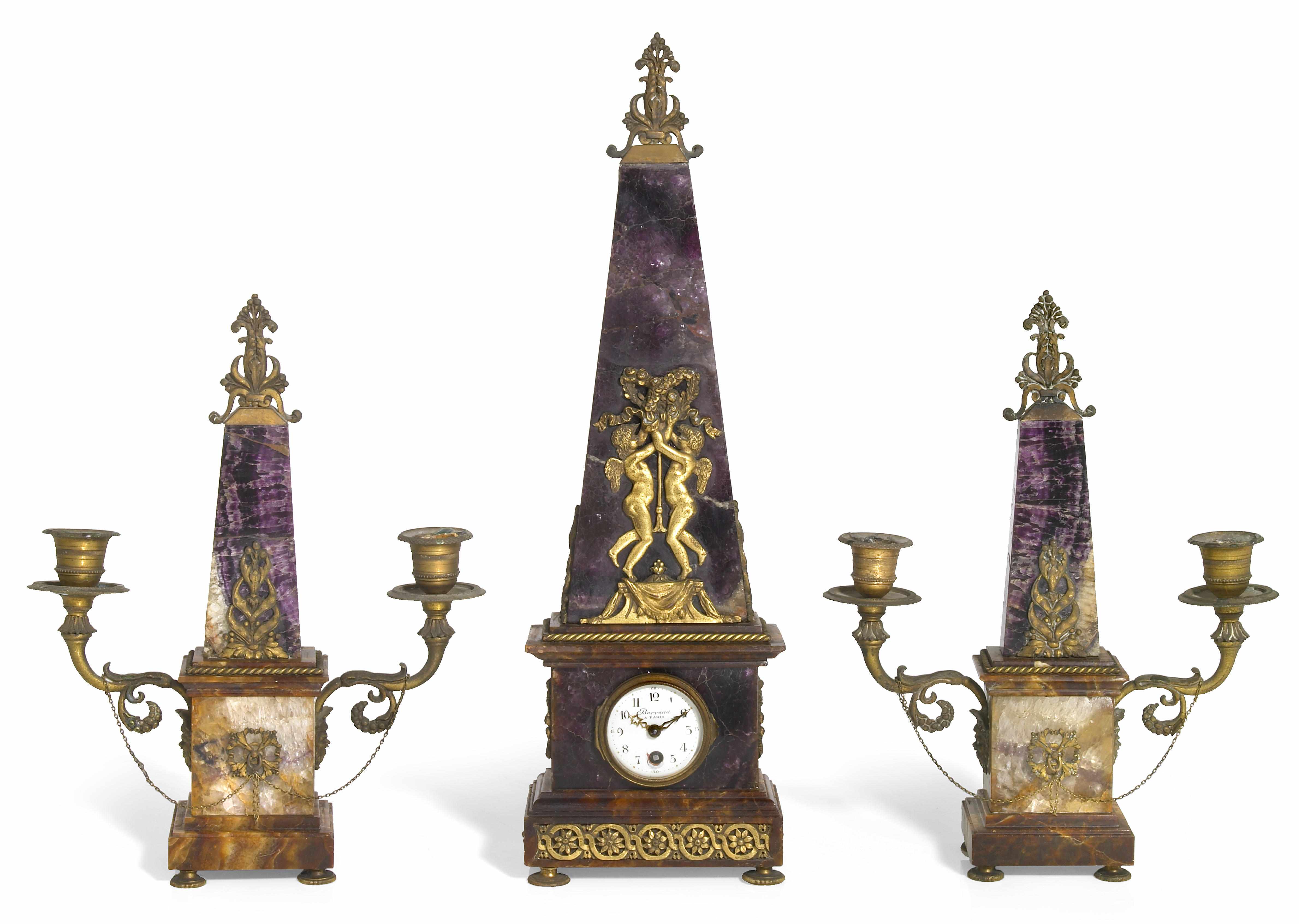 Appraisal: A French gilt bronze mounted blue john and agate clock