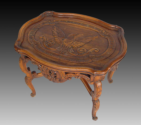 Appraisal: CARVED SIDE TABLE IN AN EAGLE MOTIF Carved eagle top