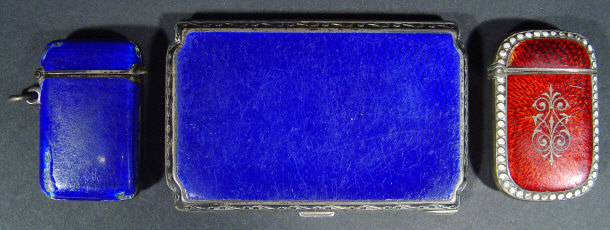 Appraisal: Rectangular silver cigarette case with blue enamel decoration together with