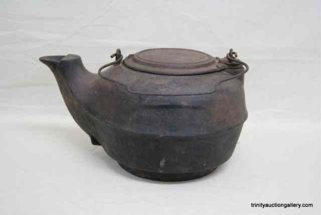 Appraisal: Vintage Large Cast Iron Tea PotUsed on campfires and wood