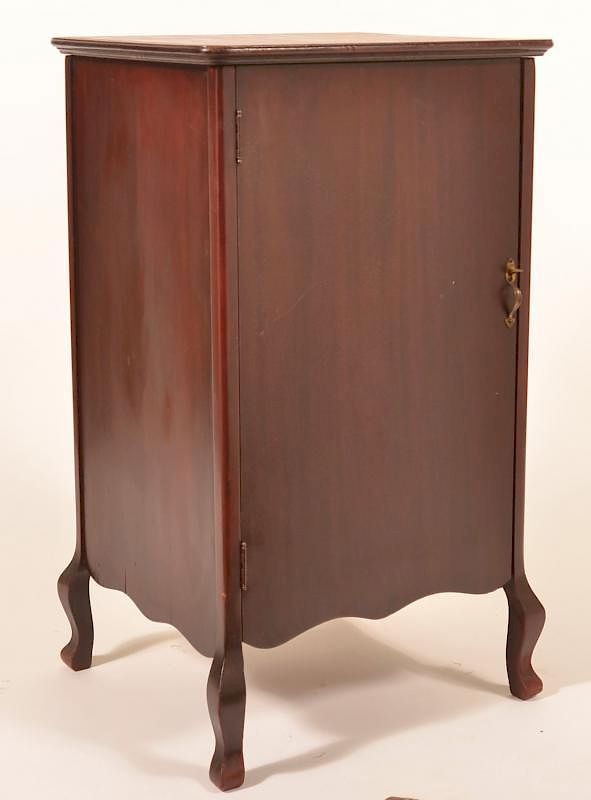 Appraisal: Mahogany record sheet music cabinet Mahogany record sheet music cabinet