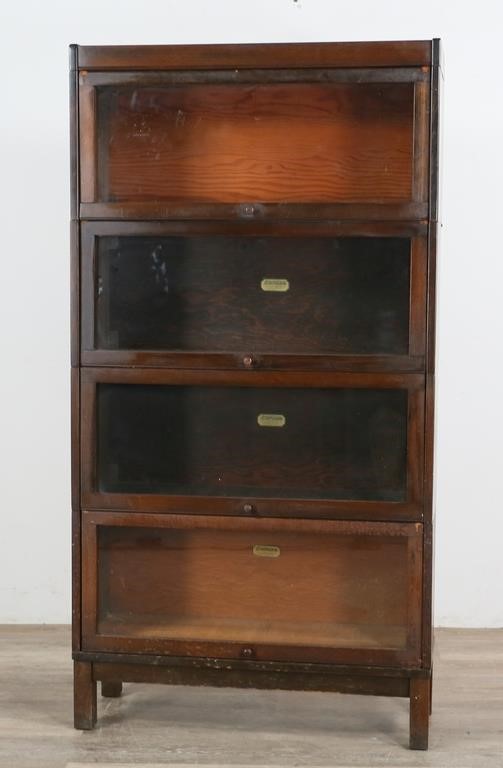 Appraisal: Arts and Crafts stack sectional barrister bookcase produced by the