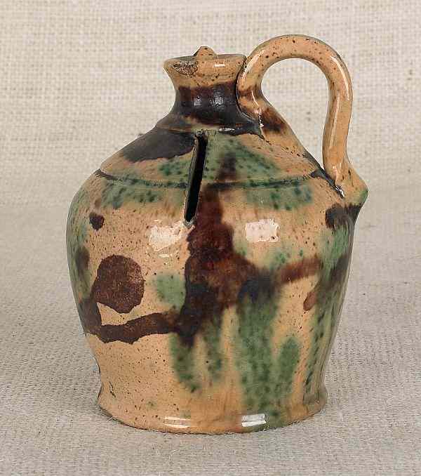 Appraisal: Pennsylvania redware bank th c possibly Wagner pottery h