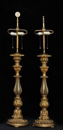 Appraisal: PAIR OF BAROQUE-STYLE CARVED PAINTED AND GILTWOOD PRICKET STICK LAMPS