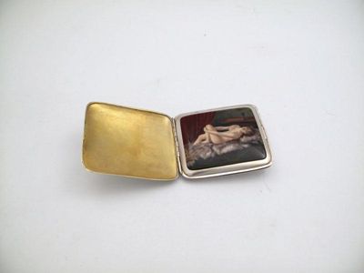 Appraisal: A German silver and enamel erotic cigarette case plain rectangular