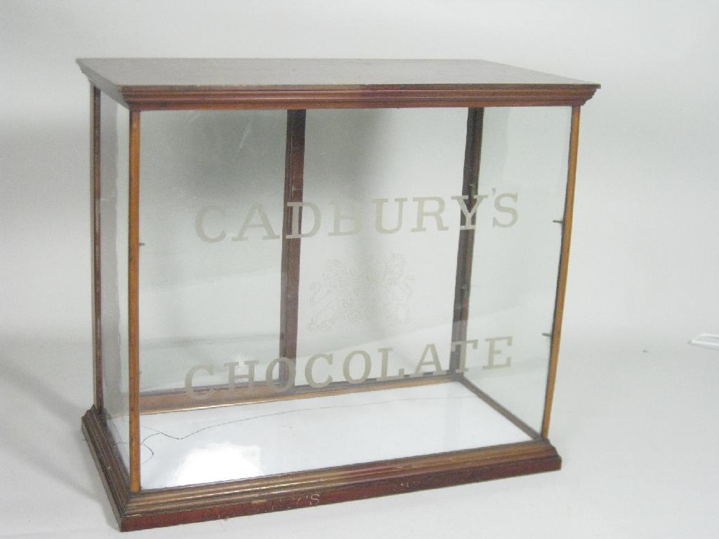 Appraisal: A mahogany framed glazed Cadbury's Chocolate table Display Cabinet with