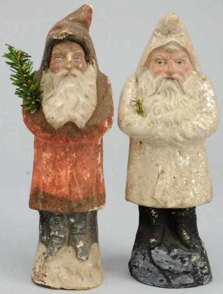 Appraisal: Lot of Belsnickle Santas Holding Fir Trees One is paper