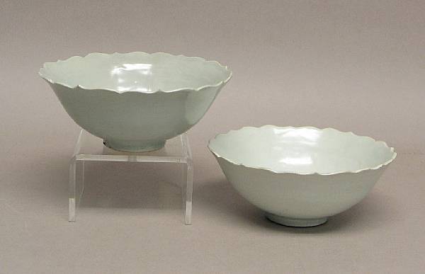 Appraisal: Two pale celadon glazed foliate-rimmed bowls Late Ming Dynasty Each