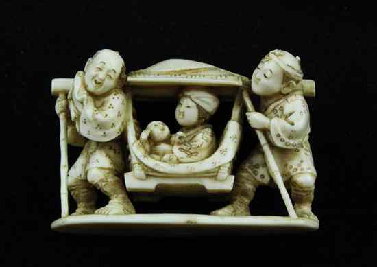 Appraisal: A small Meiji period ivory okimono carved as a sedan