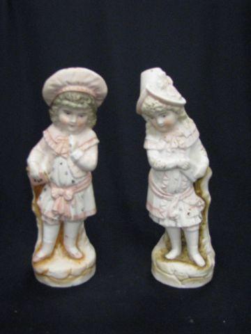 Appraisal: Pair of Victorian Bisque Figurine boy girl