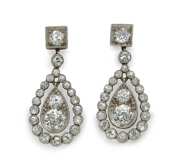 Appraisal: A pair of diamond ear studs with pendant jackets estimated