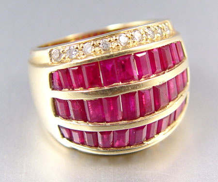 Appraisal: K RUBY AND DIAMOND RING K yellow gold ring contains