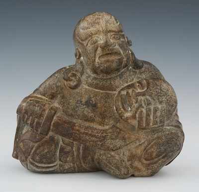 Appraisal: A Chinese Speckled Hardstone of a Seated Actor Hand carved