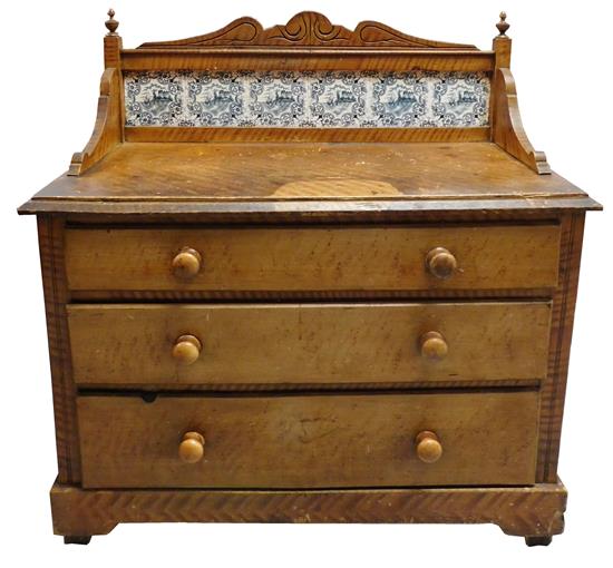 Appraisal: th C grain-painted chest of three drawers shaped backsplash with