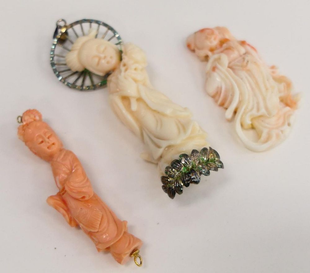 Appraisal: CHINESE COLLECTION OF CORAL QUAN YIN PENDANTS One is pure