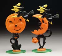 Appraisal: PAIR OF SPRING WITCHES WITH MOON Black cat supports moon