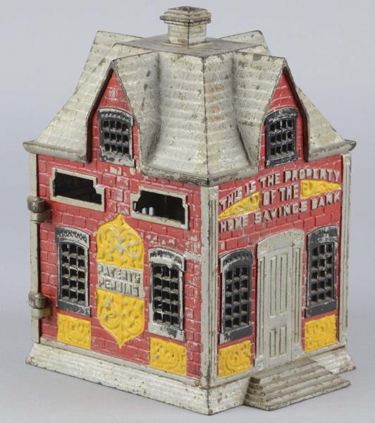 Appraisal: House Painted Cast Iron Advertising Still Bank This cast iron