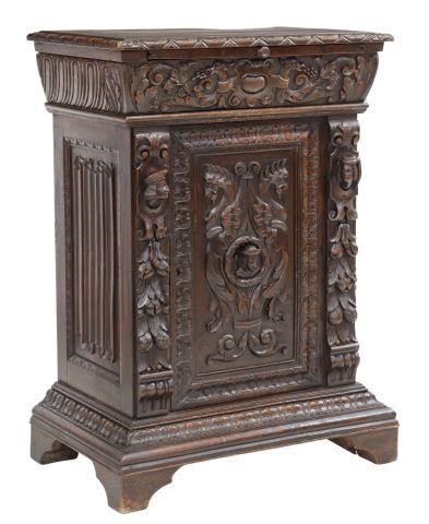 Appraisal: French Renaissance Revival style oak confiturier cabinet th c stylized