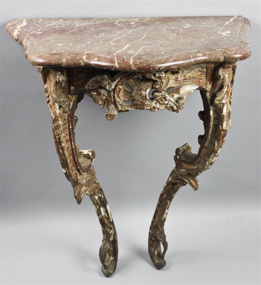 Appraisal: LOUIS XV CARVED MARBLE TOP WALL MOUNTING CONSOLE TABLE having