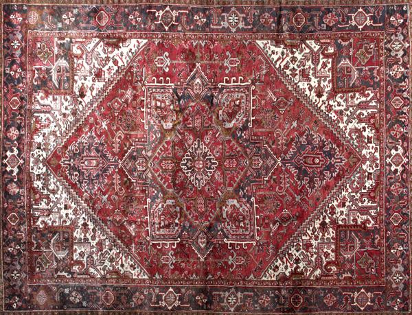 Appraisal: HERIZ Room-size rug with red hexagonal center medallion with ivory